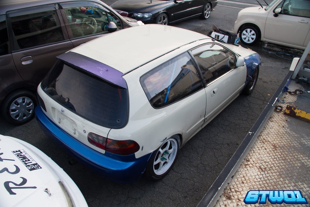 white car with blue and purple